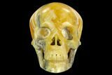 Realistic, Polished, Banded Orange Calcite Skull - Fluorescent! #127594-1